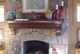 Fireplace with wooden mantle